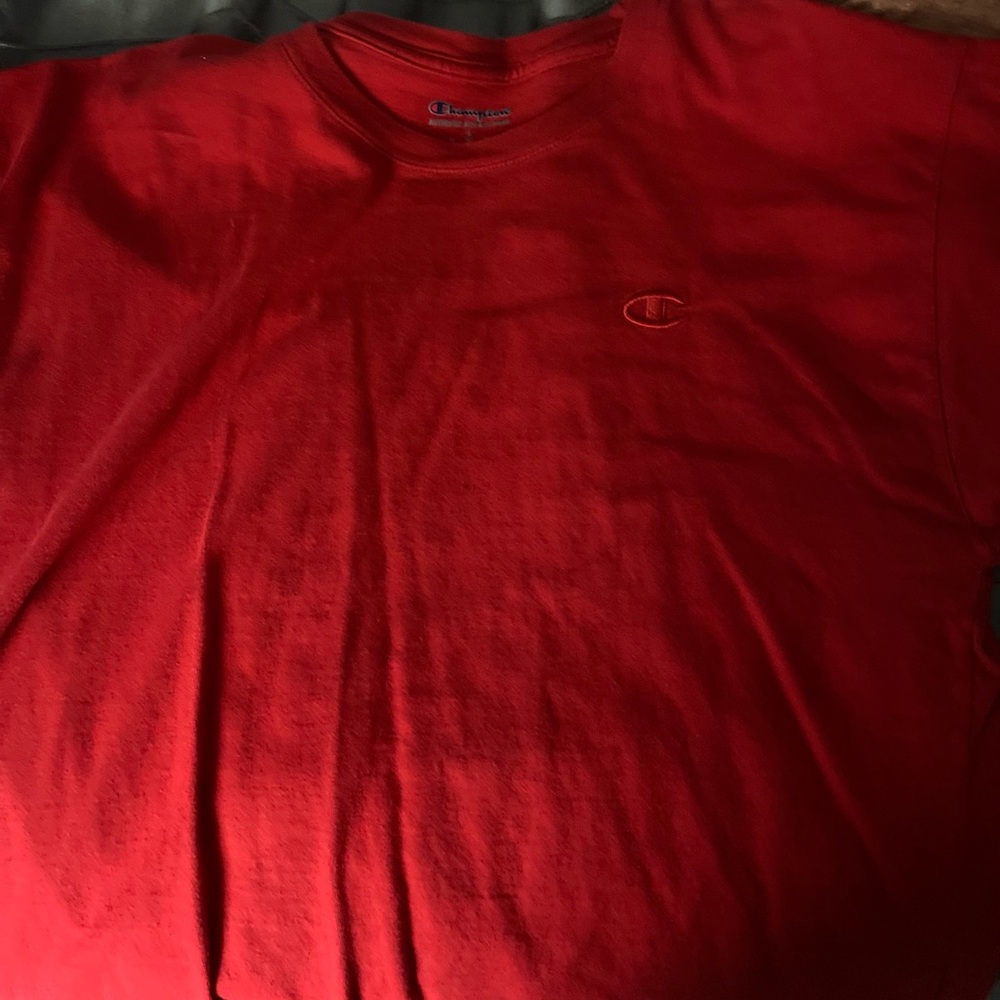 A red champion shirt